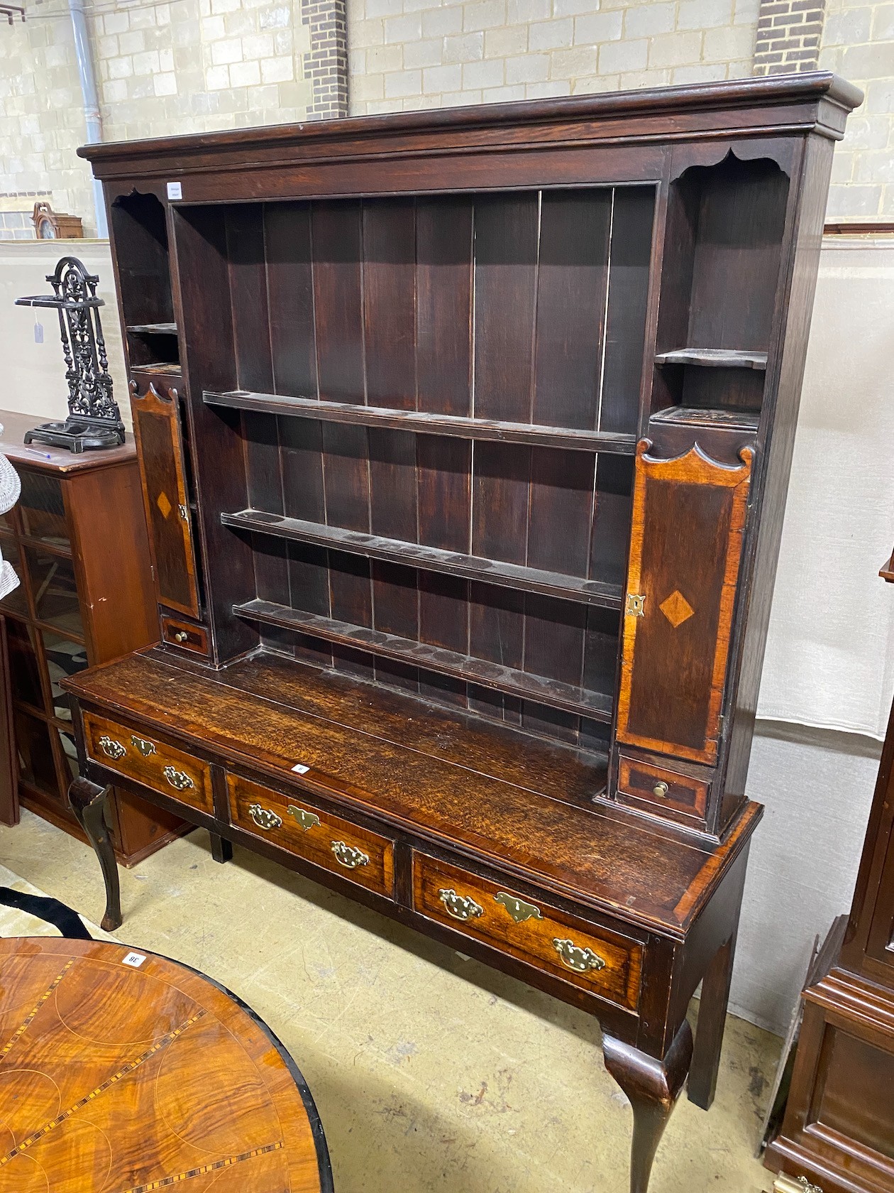 A George III style banded oak dresser, with boarded rack, width 163cm, depth 44cm, height 198cm